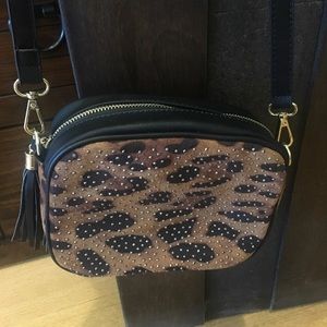 Cross body animal print hand bag